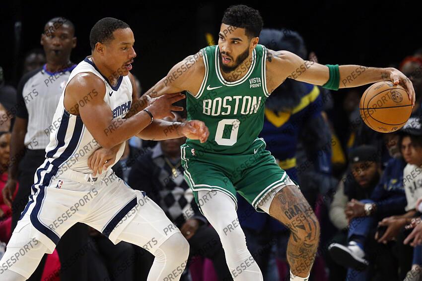 Nov 19, 2023; Memphis, Tennessee, USA; Boston Celtics forward Jayson Tatum (0) dribbles as Memphis Grizzlies guard Desmond Bane (22) defends during the second half at FedExForum. Mandatory Credit: Petre Thomas-USA TODAY Sports NBA: Boston Celtics at Memphis Grizzlies 
