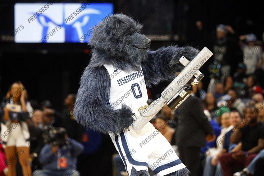 Nov 19, 2023; Memphis, Tennessee, USA; Memphis Grizzlies mascot Grizz shoots t-shirts into the crowd during the first half against the Boston Celtics at FedExForum. Mandatory Credit: Petre Thomas-USA TODAY Sports NBA: Boston Celtics at Memphis Grizzlies 
