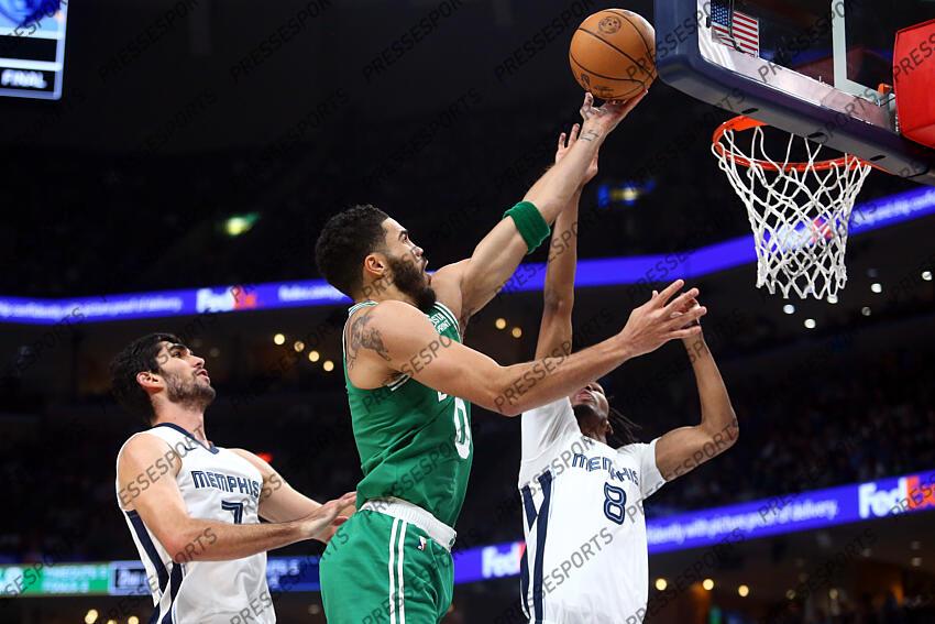 Nov 19, 2023; Memphis, Tennessee, USA; Boston Celtics forward Jayson Tatum (0) shoots against Memphis Grizzlies forward-center Santi Aldama (7) and forward Ziaire Williams (8) during the first half at FedExForum. Mandatory Credit: Petre Thomas-USA TODAY Sports NBA: Boston Celtics at Memphis Grizzlies 