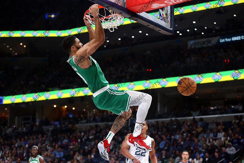 Nov 19, 2023; Memphis, Tennessee, USA; Boston Celtics forward Jayson Tatum (0) dunks during the first half against the Memphis Grizzlies at FedExForum. Mandatory Credit: Petre Thomas-USA TODAY Sports NBA: Boston Celtics at Memphis Grizzlies 