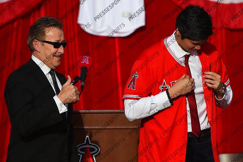 Dec 9, 2017; Anaheim, CA, USA; Los Angeles Angels player Shohei Ohtani (17) is introduced as the newest member of the Angels organization by owner Arte Moreno at Anaheim Stadium of Anaheim. Mandatory Credit: Jayne Kamin-Oncea-USA TODAY Sports MLB: Los Angeles Angels-Press Conference 