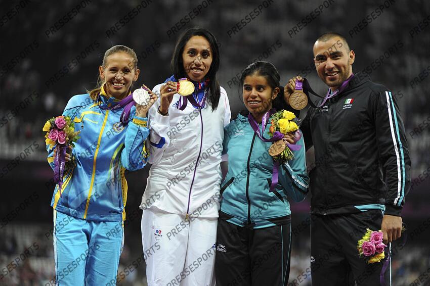 L'athlète française Assia El Hannouni, championne paralympique à Londres en 2012. Médaille d'or et Record du Monde en Catégorie T12 sur 200 m en 24”46 guidée par Gauthier Simounet Médaille d'or sur 400 m T12 : 55”39 (non guidée) JO PARALYMPIQUES LONDRES 