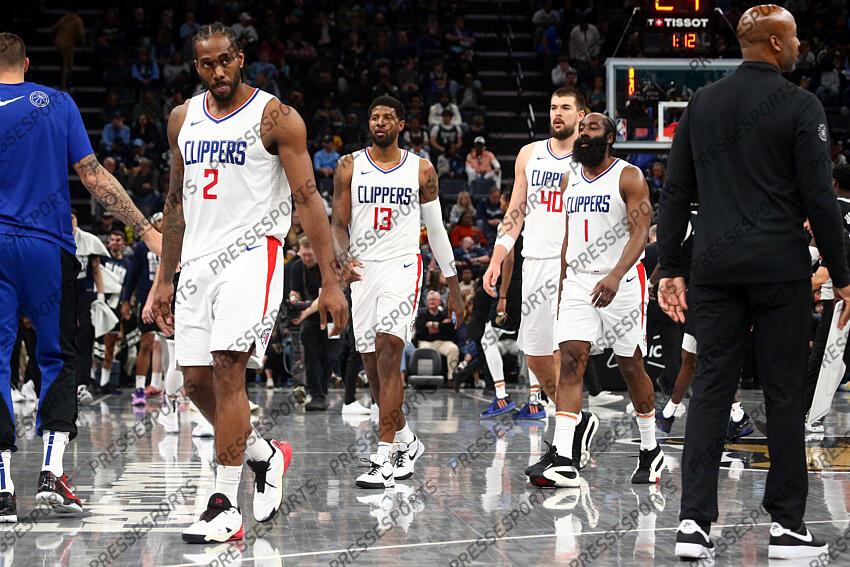 Feb 23, 2024; Memphis, Tennessee, USA; Los Angeles Clippers forward Kawhi Leonard (2), forward Paul George (13), center Ivica Zubac (40) and guard James Harden (1) walk to the bench during a time out during the second half against the Memphis Grizzlies at FedExForum. Mandatory Credit: Petre Thomas-USA TODAY Sports NBA: Los Angeles Clippers at Memphis Grizzlies 