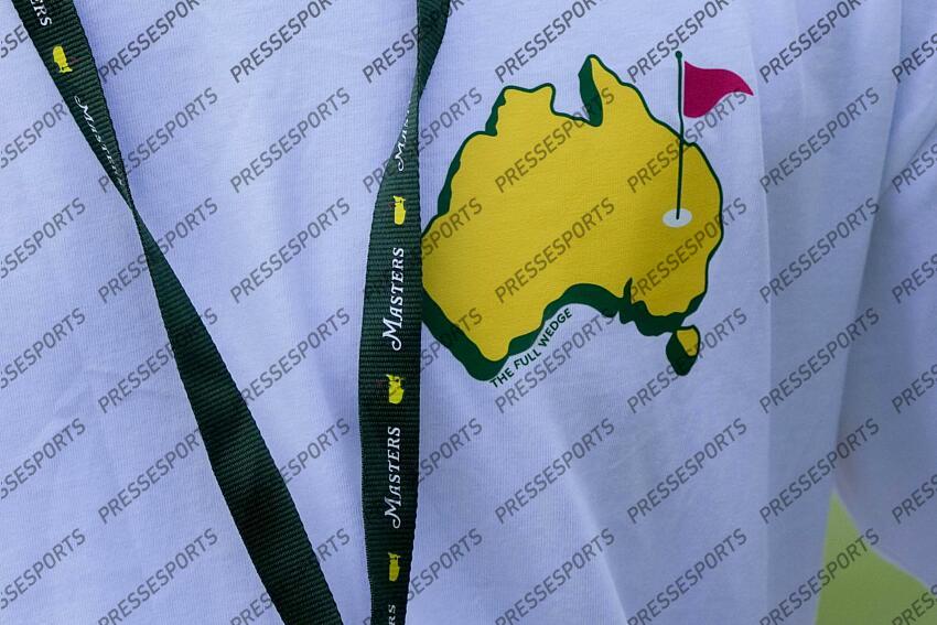 Apr 10, 2024; Augusta, Georgia, USA; A patron wears a shirt with a logo depicting Australia as the Masters logo during the Par 3 Contest at Augusta National Golf Club. Mandatory Credit: Michael Madrid-USA TODAY Network concours par 3 PGA: Masters Tournament - Par 3 Contest 