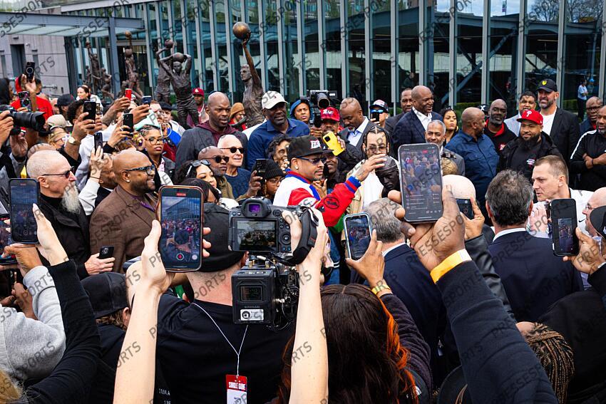 Apr 12, 2024; Camden, NJ, USA; Philadelphia 76ers great Allen Iverson touches the head of his statue during a ceremony outside Penn Medicine Philadelphia 76ers Training Complex. Mandatory Credit: Bill Streicher-USA TODAY Sports NBA: Philadelphia 76ers-Iverson Statue Ceremony 