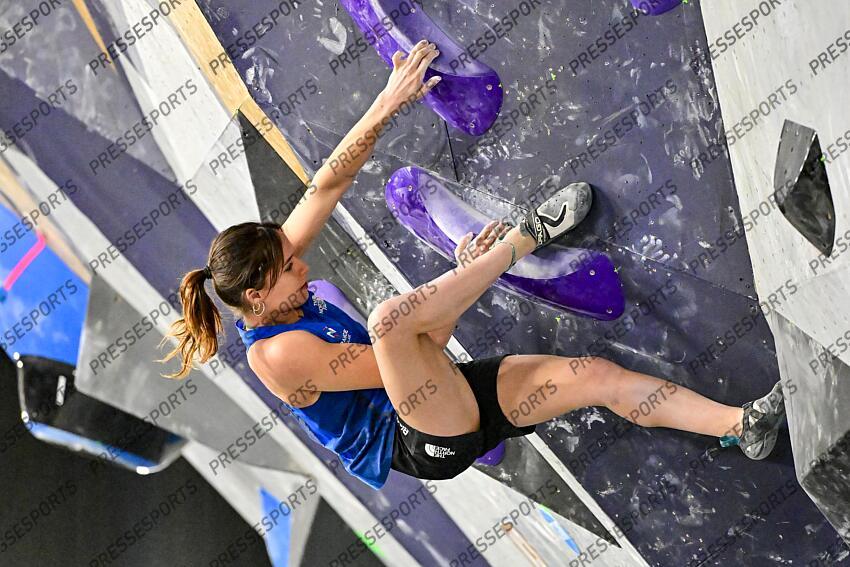 May 5, 2024; Salt Lake City, UTAH, USA; Oriane Bertone of France heel hooks while competing in the IFSC World Cup women's boulder final at the USA Climbing National Training Center. Mandatory Credit: Christopher Creveling-USA TODAY Sports Climbing: IFSC Climbing World Cup 