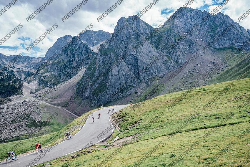 Picture by Zac Williams/SWpix.com - 13/07/2024 - Cycling - 2024 Tour de France - Stage 14 Pau - Saint-Lary-Soulan Pla D'Adet, France - The grupetto descends the Col du Tourmalet. PAU/ST LARY SOULAN PLA D'ADET 