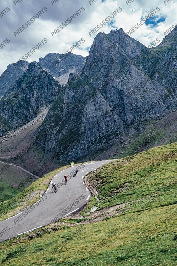 Picture by Zac Williams/SWpix.com - 13/07/2024 - Cycling - 2024 Tour de France - Stage 14 Pau - Saint-Lary-Soulan Pla D'Adet, France - The grupetto descends the Col du Tourmalet. PAU/ST LARY SOULAN PLA D'ADET 