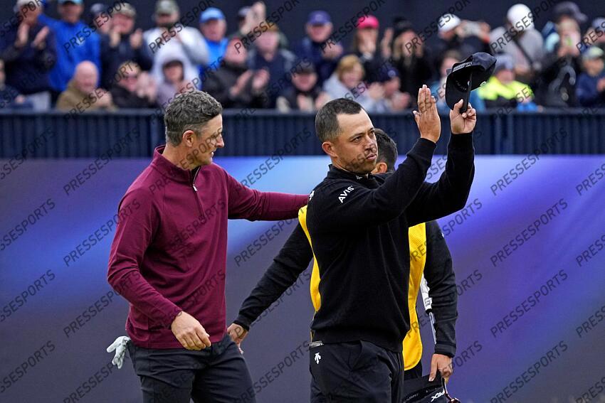 Jul 21, 2024; Ayrshire, SCT; Xander Schauffele acknowledges the gallery on the 18th green during the final round of the Open Championship golf tournament at Royal Troon. Mandatory Credit: Jack Gruber-USA TODAY Sports PGA: The Open Championship - Final Round 