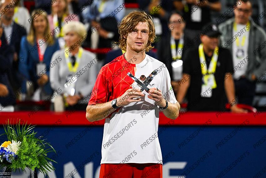 Aug 12, 2024; Montreal, Quebec, Canada; Andrey Rublev finalist of the singles final holds his trophy at IGA Stadium. Mandatory Credit: David Kirouac-USA TODAY Sports FINALE POPYRIN/RUBLEV 