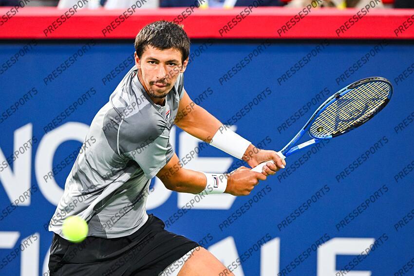 Aug 12, 2024; Montreal, Quebec, Canada; Alexei Popyrin (AUS) returns the ball to= Andrey Rublev (not pictured) during singles final play at IGA Stadium. Mandatory Credit: David Kirouac-USA TODAY Sports FINALE POPYRIN/RUBLEV 