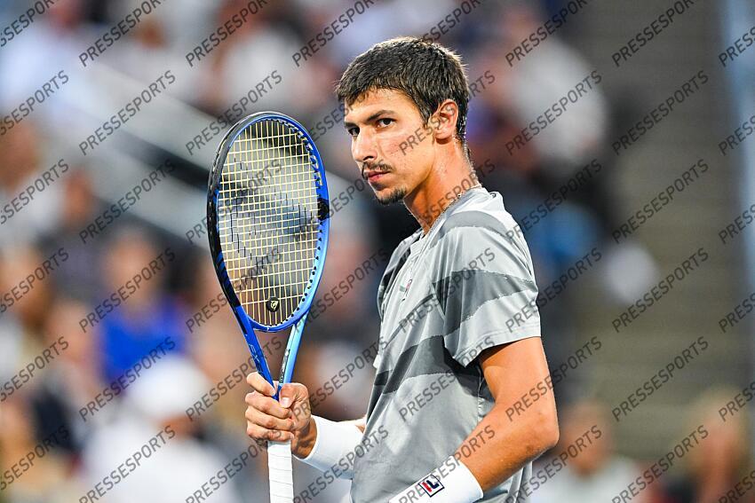 Aug 12, 2024; Montreal, Quebec, Canada; Alexei Popyrin (AUS) reacts after scoring a point against Andrey Rublev (not pictured) during singles final play at IGA Stadium. Mandatory Credit: David Kirouac-USA TODAY Sports FINALE POPYRIN/RUBLEV 