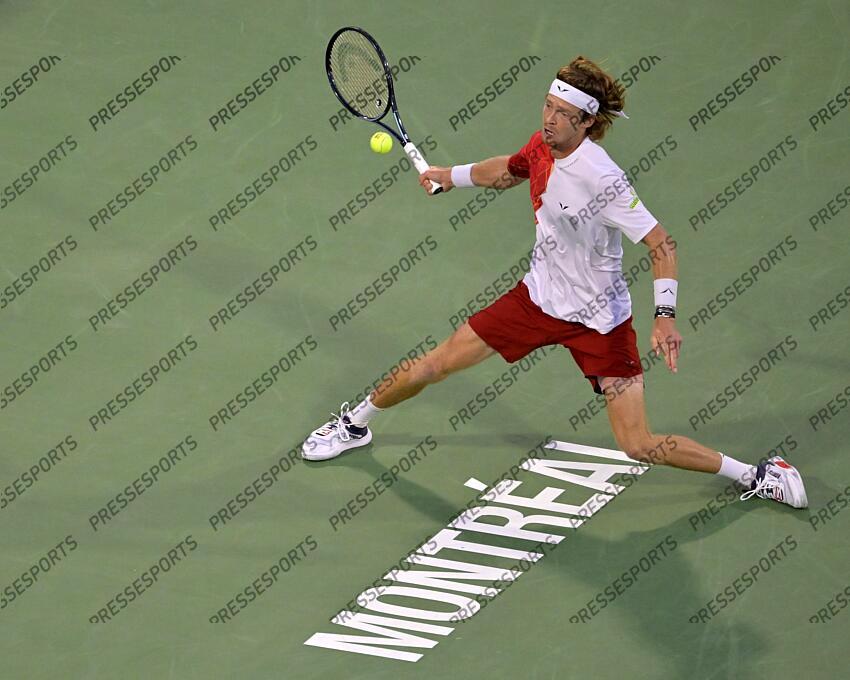 Aug 12, 2024; Montreal, Quebec, Canada; Andrey Rublev hits a forehand against Alexei Popyrin (AUS) (not pictured) during singles final play at IGA Stadium. Mandatory Credit: Eric Bolte-USA TODAY Sports FINALE POPYRIN/RUBLEV 