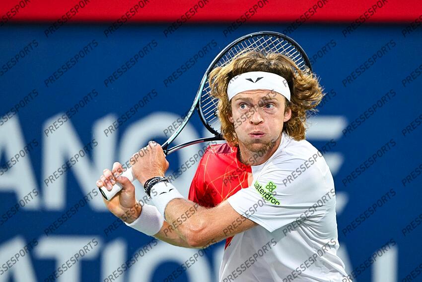 Aug 12, 2024; Montreal, Quebec, Canada; Andrey Rublev tracks hios shots against Alexei Popyrin (AUS) (not pictured) during singles final play at IGA Stadium. Mandatory Credit: David Kirouac-USA TODAY Sports FINALE POPYRIN/RUBLEV 