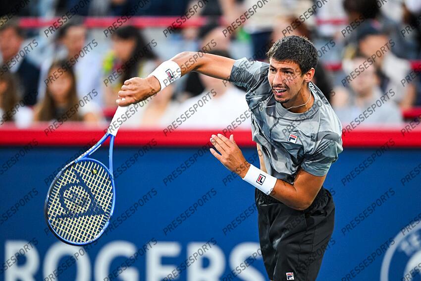 Aug 12, 2024; Montreal, Quebec, Canada; Alexei Popyrin (AUS) serves the ball to Andrey Rublev (not pictured) during singles final play at IGA Stadium. Mandatory Credit: David Kirouac-USA TODAY Sports FINALE POPYRIN/RUBLEV 