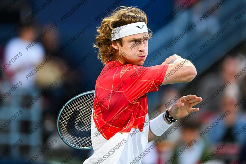 Aug 12, 2024; Montreal, Quebec, Canada; Andrey Rublev returns the ball to Alexei Popyrin (AUS) (not pictured) during singles final play at IGA Stadium. Mandatory Credit: David Kirouac-USA TODAY Sports FINALE POPYRIN/RUBLEV 