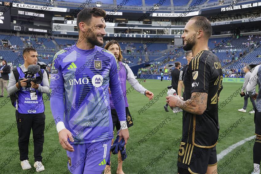 Aug 17, 2024; Seattle, Washington, USA; Los Angeles FC goalkeeper Hugo Lloris (1) greets Los Angeles FC defender Maxime Chanot (25) after a Leagues Cup quarterfinal match at Lumen Field. Mandatory Credit: John Froschauer-USA TODAY Sports MLS: Leagues Cup-Quarterfinals-LAFC at Seattle Sounders FC 