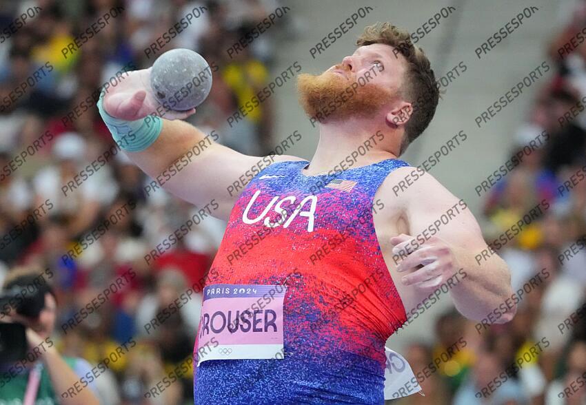 Aug 3, 2024; Paris, FRANCE; Ryan Crouser (USA) in the men's shot put final during the Paris 2024 Olympic Summer Games at Stade de France. Mandatory Credit: Kirby Lee-USA TODAY Sports LANCER DU POIDS HOMMES 