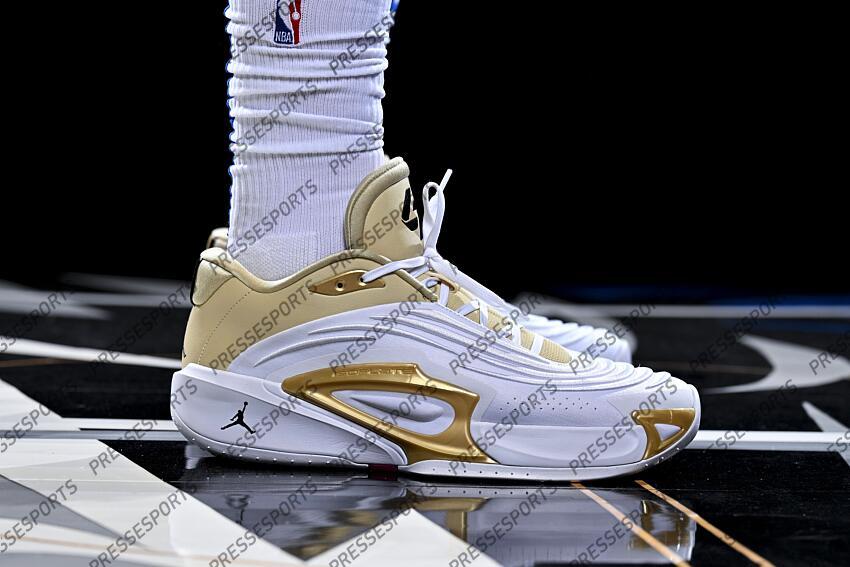 Sep 30, 2024; Dallas, TX, USA; A view of the shoes of Dallas Mavericks guard Luka Doncic (77) as he poses for a photo during the 2024 Dallas Mavericks media day. Mandatory Credit: Jerome Miron-Imagn Images Dallas Mavericks-Media Day 