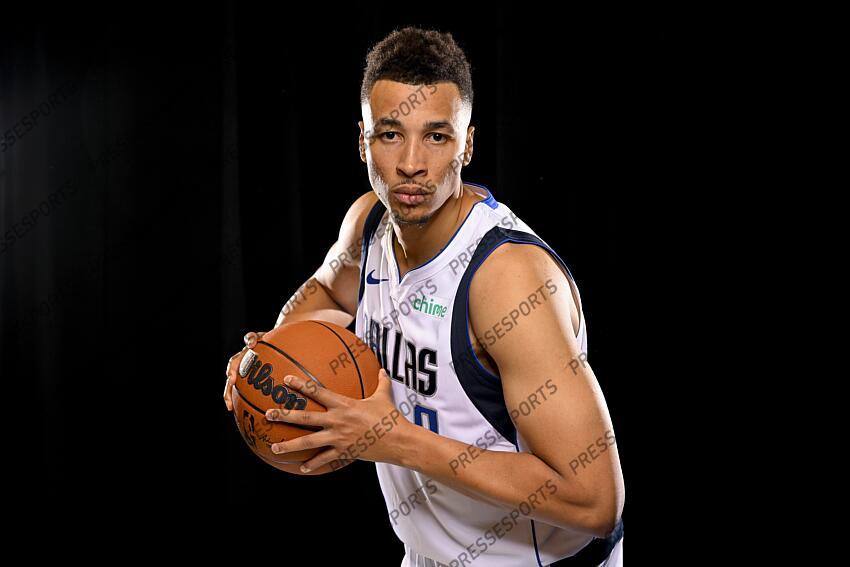 Sep 30, 2024; Dallas, TX, USA; Dallas Mavericks guard Dante Exum (0) poses for a photo during the 2024 Dallas Mavericks media day. Mandatory Credit: Jerome Miron-Imagn Images Dallas Mavericks-Media Day 