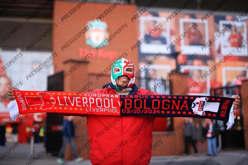 2nd October 2024 - UEFA Champions League - League Phase - Liverpool v Bologna - A fan poses with a half-and-half scarf wearing a Mexican lucha libre wrestling mask before the match - Photo: Simon Stacpoole / Offside. LIVERPOOL-BOLOGNE (2-0) 