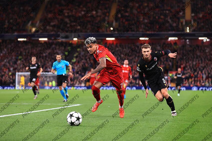 2nd October 2024 - UEFA Champions League - Liverpool FC v Bologna FC - Luis Diaz of Liverpool gets away from Stefan Posch of Bologna - Photo: Simon Stacpoole / Offside. LIVERPOOL-BOLOGNE (2-0) 