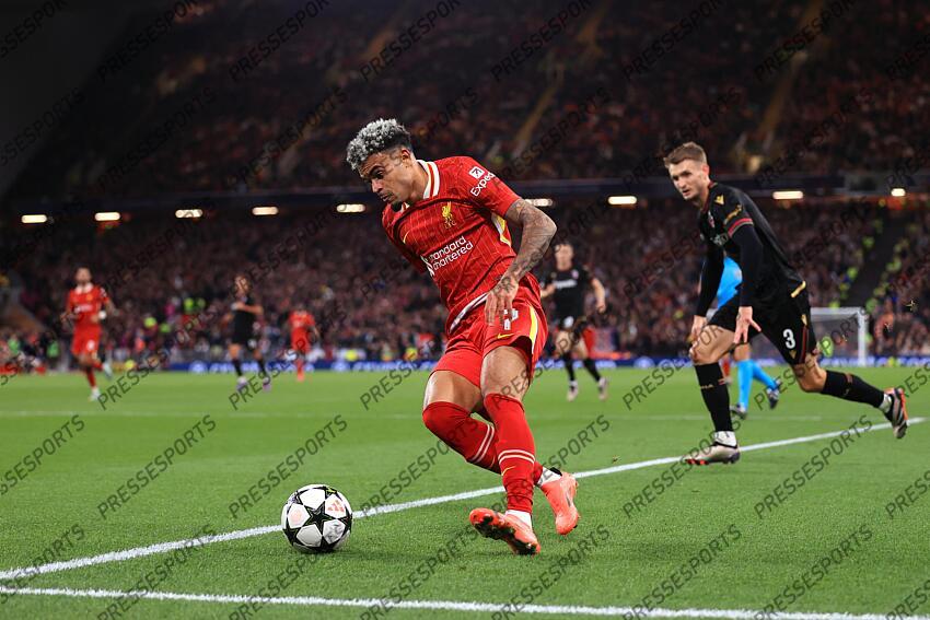 2nd October 2024 - UEFA Champions League - Liverpool FC v Bologna FC - Luis Diaz of Liverpool gets away from Stefan Posch of Bologna - Photo: Simon Stacpoole / Offside. LIVERPOOL-BOLOGNE (2-0) 