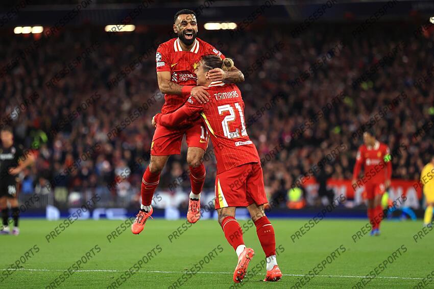 2nd October 2024 - UEFA Champions League - Liverpool FC v Bologna FC - Mohamed Salah of Liverpool celebrates the second goal with Kostas Tsimikas - Photo: Simon Stacpoole / Offside. LIVERPOOL-BOLOGNE (2-0) 