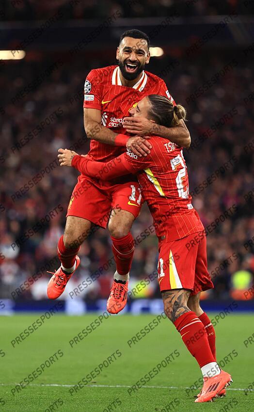 2nd October 2024 - UEFA Champions League - Liverpool FC v Bologna FC - Mohamed Salah of Liverpool celebrates the second goal with Kostas Tsimikas - Photo: Simon Stacpoole / Offside. LIVERPOOL-BOLOGNE (2-0) 