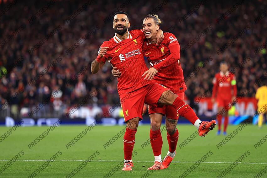 2nd October 2024 - UEFA Champions League - Liverpool FC v Bologna FC - Mohamed Salah of Liverpool celebrates the second goal with Kostas Tsimikas - Photo: Simon Stacpoole / Offside. LIVERPOOL-BOLOGNE (2-0) 