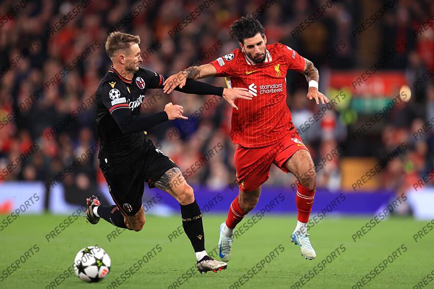 2nd October 2024 - UEFA Champions League - Liverpool FC v Bologna FC - Stefan Posch of Bologna and Dominik Szoboszlai of Liverpool - Photo: Simon Stacpoole / Offside. LIVERPOOL-BOLOGNE (2-0) 