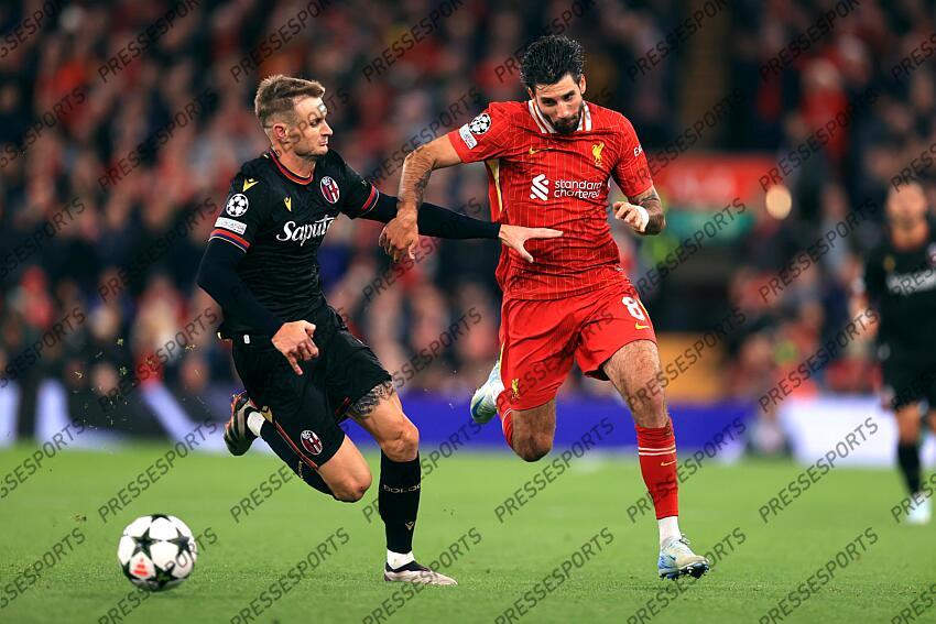 2nd October 2024 - UEFA Champions League - Liverpool FC v Bologna FC - Stefan Posch of Bologna and Dominik Szoboszlai of Liverpool - Photo: Simon Stacpoole / Offside. LIVERPOOL-BOLOGNE (2-0) 