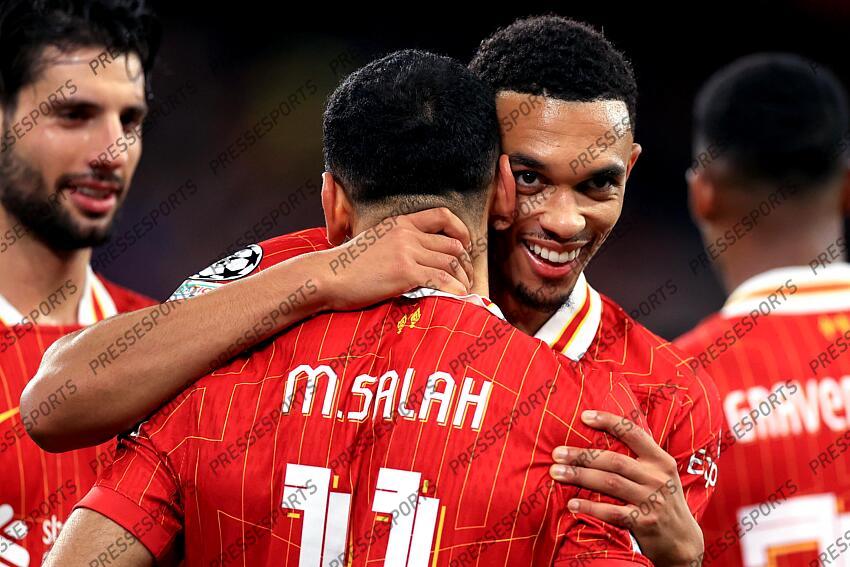 2nd October 2024 - UEFA Champions League - Liverpool FC v Bologna FC - Trent Alexander-Arnold of Liverpool celebrates with Mohamed Salah - Photo: Simon Stacpoole / Offside. LIVERPOOL-BOLOGNE (2-0) 