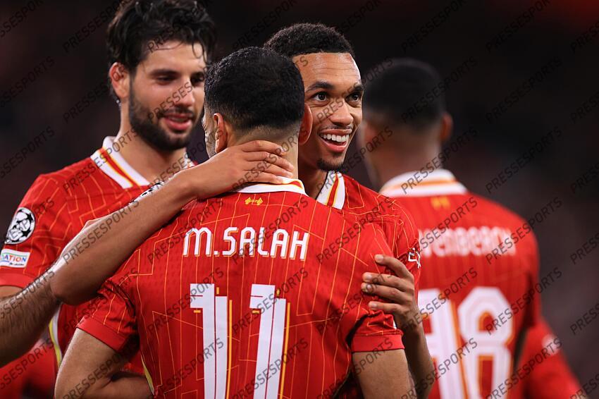 2nd October 2024 - UEFA Champions League - Liverpool FC v Bologna FC - Trent Alexander-Arnold of Liverpool celebrates with Mohamed Salah - Photo: Simon Stacpoole / Offside. LIVERPOOL-BOLOGNE (2-0) 