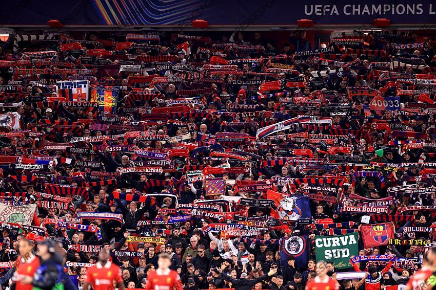 2nd October 2024 - UEFA Champions League - Liverpool FC v Bologna FC - Bologna fans hold their scarves aloft - Photo: Simon Stacpoole / Offside. LIVERPOOL-BOLOGNE (2-0) 
