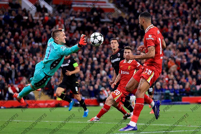 2nd October 2024 - UEFA Champions League - Liverpool FC v Bologna FC - Bologna goalkeeper Lukasz Skorupski dives to make a save - Photo: Simon Stacpoole / Offside. LIVERPOOL-BOLOGNE (2-0) 