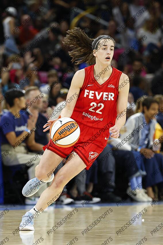 Aug 30, 2024; Chicago, Illinois, USA; Indiana Fever guard Caitlin Clark (22) brings the ball up court against the Chicago Sky during the first half at Wintrust Arena. Mandatory Credit: Kamil Krzaczynski-USA TODAY Sports WNBA: Indiana Fever at Chicago Sky 