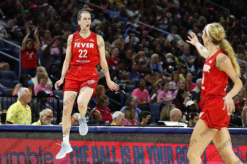 Aug 30, 2024; Chicago, Illinois, USA; Indiana Fever guard Caitlin Clark (22) celebrates after scoring against the Chicago Sky during the second half at Wintrust Arena. Mandatory Credit: Kamil Krzaczynski-USA TODAY Sports WNBA: Indiana Fever at Chicago Sky 