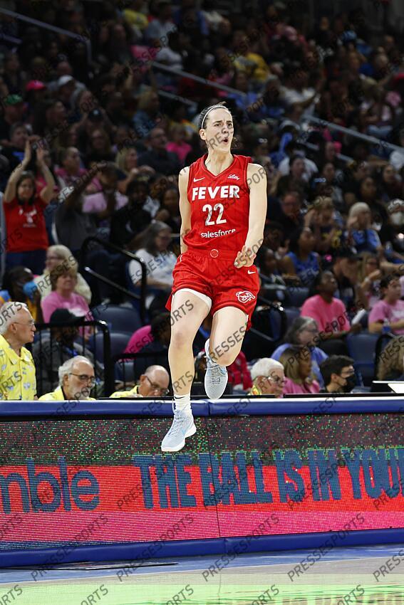 Aug 30, 2024; Chicago, Illinois, USA; Indiana Fever guard Caitlin Clark (22) celebrates after scoring against the Chicago Sky during the second half at Wintrust Arena. Mandatory Credit: Kamil Krzaczynski-USA TODAY Sports WNBA: Indiana Fever at Chicago Sky 