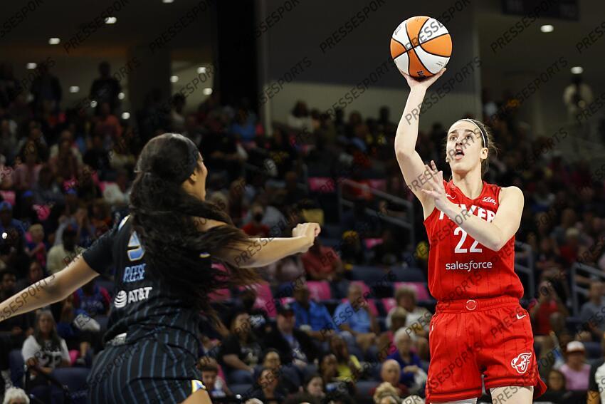 Aug 30, 2024; Chicago, Illinois, USA; Indiana Fever guard Caitlin Clark (22) shoots against Chicago Sky forward Angel Reese (5) during the first half at Wintrust Arena. Mandatory Credit: Kamil Krzaczynski-USA TODAY Sports WNBA: Indiana Fever at Chicago Sky 