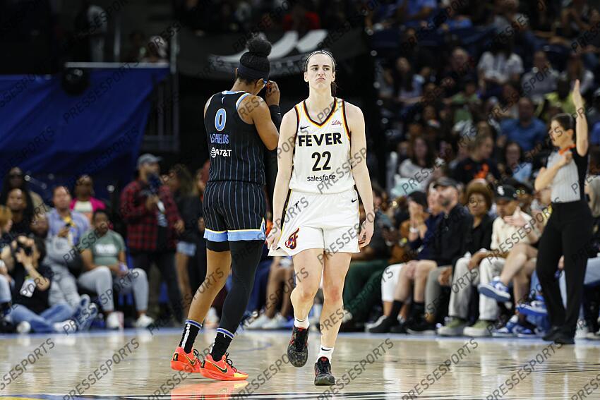 Jun 23, 2024; Chicago, Illinois, USA; Indiana Fever guard Caitlin Clark (22) reacts after scoring against the Chicago Sky during the second half of a basketball game at Wintrust Arena. Mandatory Credit: Kamil Krzaczynski-USA TODAY Sports WNBA: Indiana Fever at Chicago Sky 