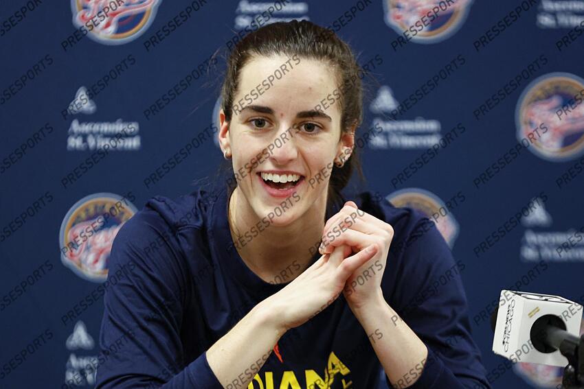 Jun 23, 2024; Chicago, Illinois, USA; Indiana Fever guard Caitlin Clark (22) speaks during a press conference before a game against the Chicago Sky at Wintrust Arena. Mandatory Credit: Kamil Krzaczynski-USA TODAY Sports WNBA: Indiana Fever at Chicago Sky 