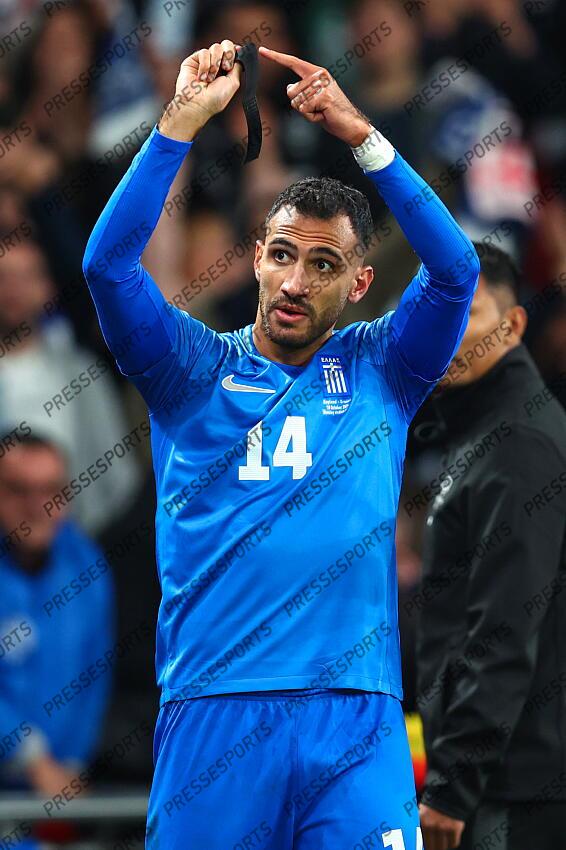 10 October 2024, London - International Football, UEFA Nation’s League - England v Greece - Vangelis Pavlidis of Greece celebrates scoring the opening goal by pointing to his black armband, worn in memory of teammate George Baldock - Photo: Charlotte Wilson / Offside. ANGLETERRE-GRECE (1-2) 
