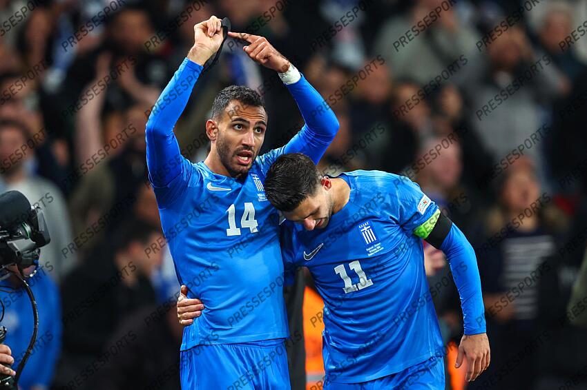 10 October 2024, London - International Football, UEFA Nation’s League - England v Greece - Vangelis Pavlidis of Greece celebrates scoring the opening goal by pointing to his black armband, worn in memory of teammate George Baldock - Photo: Charlotte Wilson / Offside. ANGLETERRE-GRECE (1-2) 