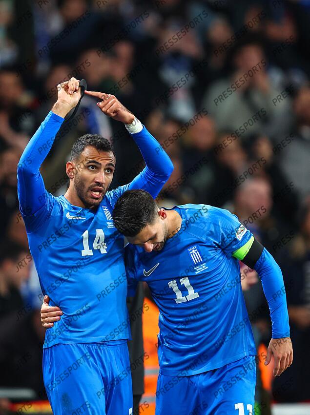 10 October 2024, London - International Football, UEFA Nation’s League - England v Greece - Vangelis Pavlidis of Greece celebrates scoring the opening goal by pointing to his black armband, worn in memory of teammate George Baldock - Photo: Charlotte Wilson / Offside. ANGLETERRE-GRECE (1-2) 