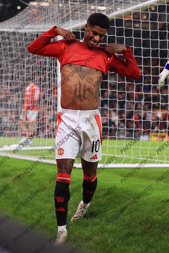 7th November 2024 - UEFA Europa League - League Phase - Manchester United v PAOK Salonika - Marcus Rashford of Manchester United reveals his tattoos on his chest as he reacts - Photo: Simon Stacpoole / Offside. MANCHESTER UNITED-PAOK SALONIQUE (2-0) 
