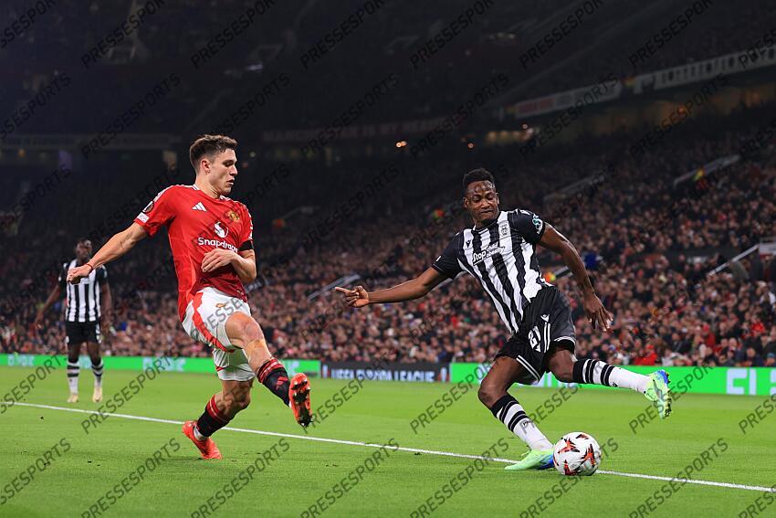 7th November 2024 - UEFA Europa League - League Phase - Manchester United v PAOK Salonika - Baba Rahman of PAOK Salonika battles with Manuel Ugarte of Manchester United - Photo: Simon Stacpoole / Offside. MANCHESTER UNITED-PAOK SALONIQUE (2-0) 