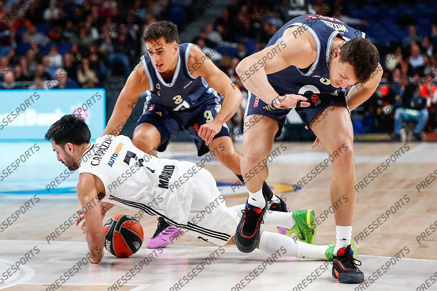 Matteo Spagnolo of Alba Berlin, Facundo Campazzo of Real Madrid and Yanni Wetzellof Alba Berlin in action during the Turkish Airlines EuroLeague Regular Season match between Real Madrid and Alba Berlin at Wizink Center on November 21, 2024 in Madrid, Spain. REAL MADRID-ALBA BERLIN (98-84) 