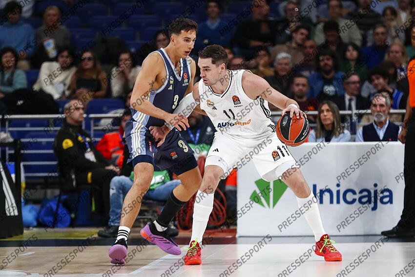 Matteo Spagnolo of Alba Berlin and Mario Hezonja of Real Madrid in action during the Turkish Airlines EuroLeague Regular Season match between Real Madrid and Alba Berlin at Wizink Center on November 21, 2024 in Madrid, Spain. REAL MADRID-ALBA BERLIN (98-84) 