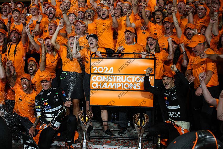 #4 Lando Norris (GBR, McLaren Formula 1 Team), #81 Oscar Piastri (AUS, McLaren Formula 1 Team) and Team of McLaren celebrates winning the 2024 World Constructors Championship, F1 Grand Prix of Abu Dhabi at Yas Marina Circuit on December 8, 2024 in Abu Dhabi, United Arab Emirates. (Photo by HOCH ZWEI) GRAND PRIX D'ABU DHABI 